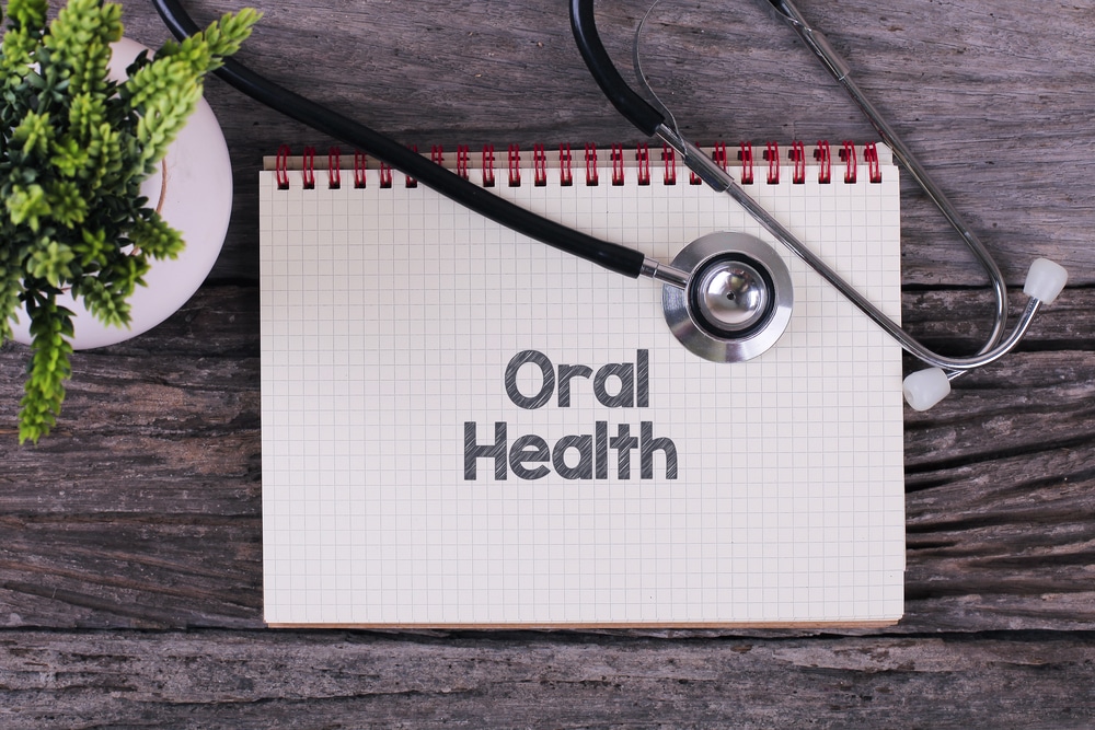 See a dentist to reduce your risk of developing chronic health conditions like diabetes and heart disease.
